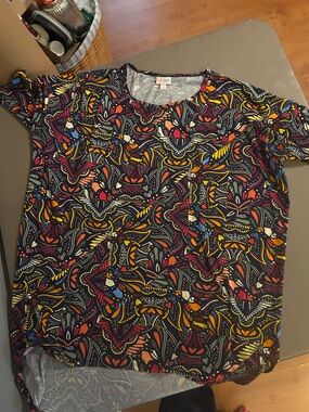 LuLaRoe Irma Top in Black with Multicolor Print - unicorn!